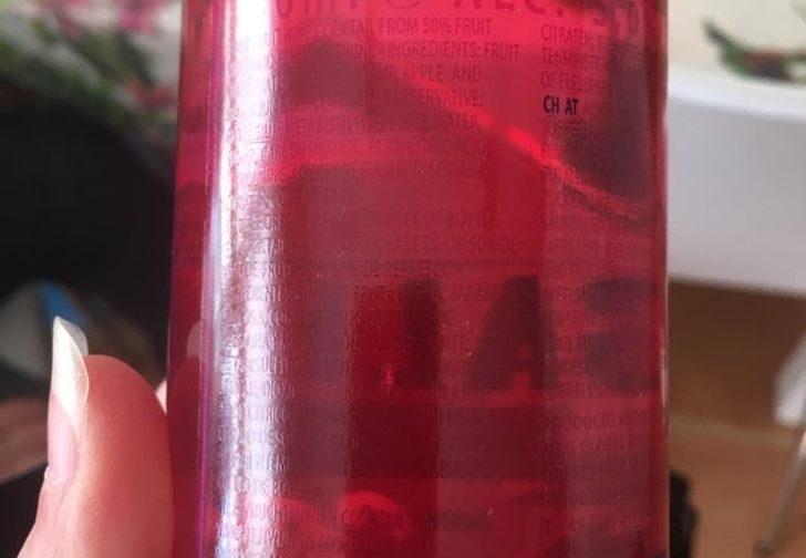 This bottle has the ingredients list in the same color as the liquid inside.