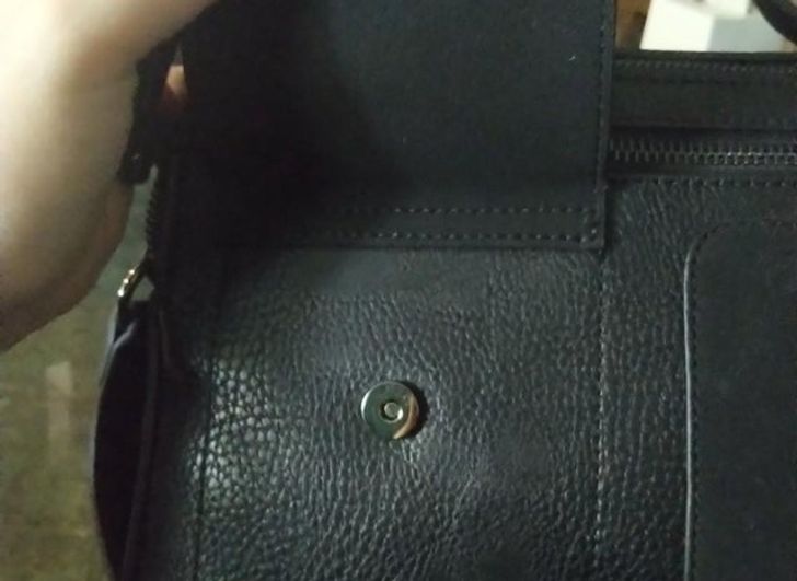 “Bought this bag online because of the cool front pocket, or rather, fake pocket.”