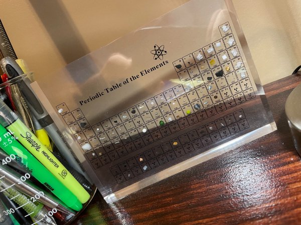“My girlfriend got me a periodic table of elements with actual samples of elements when I finished my science degree.”