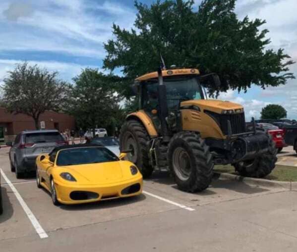 “Only in Texas…a Ferrari parked next to a tractor at a local high school (and yes both were driven there by students).”