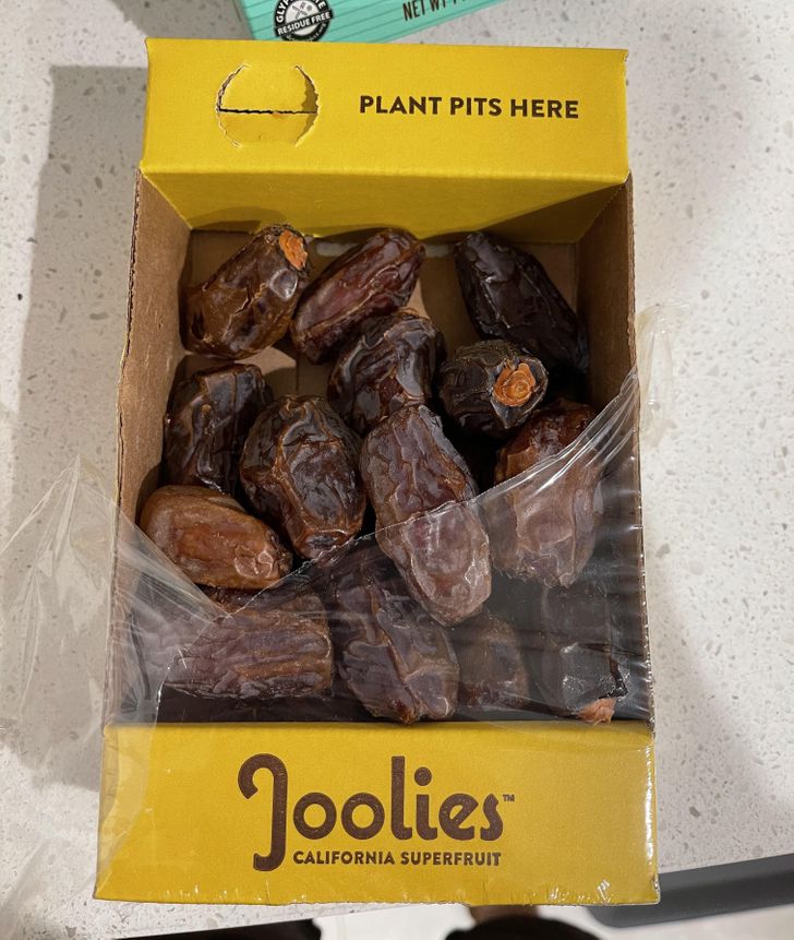 This box of dates comes with a built-in area to throw away the pits.