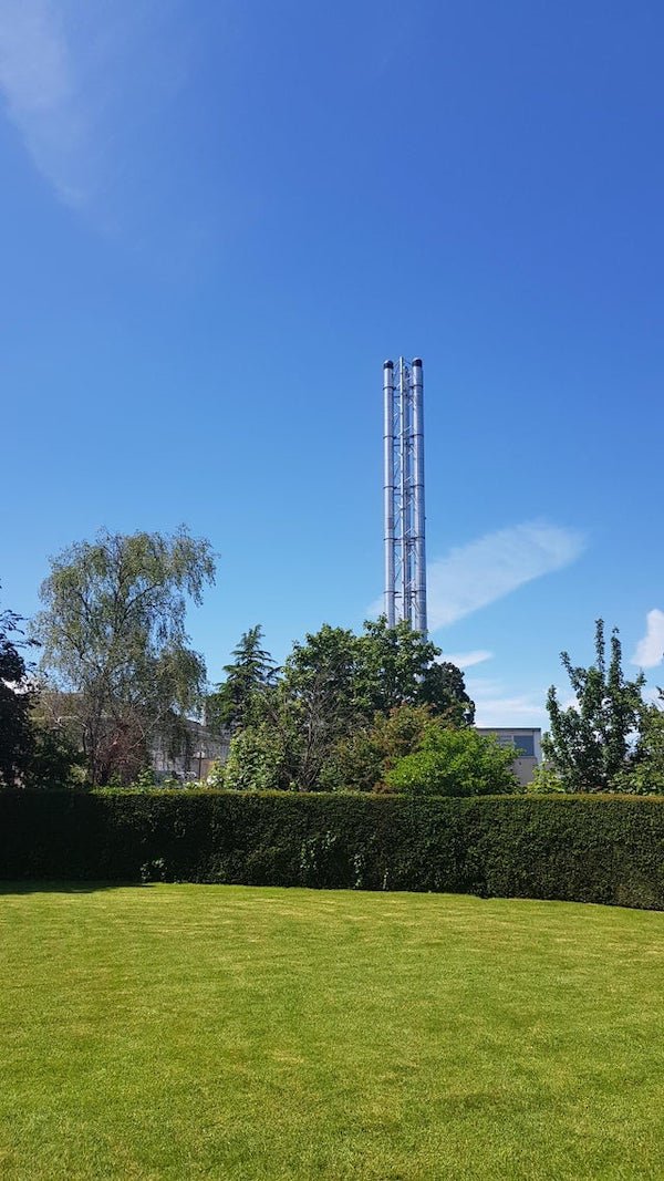 Tall metal structure in a Hospital Complex

A: It is the boiler for the whole Hospital. Produces steam to heat the place and waters.