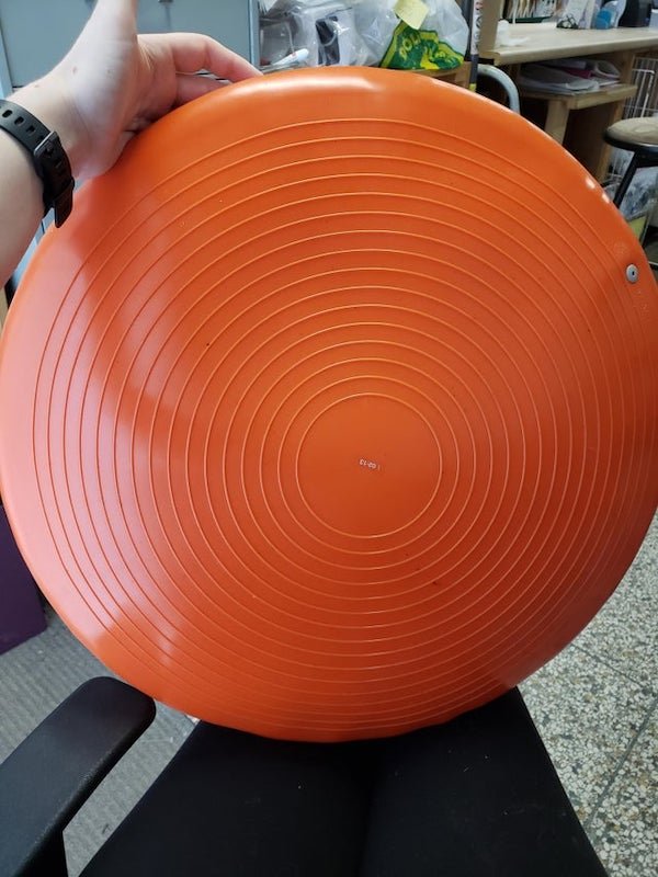 What is this squishy, orange disc that was donated to a thrift shop?

A: It’s called a stability disc. Supposed to mimic sitting on a balance ball.