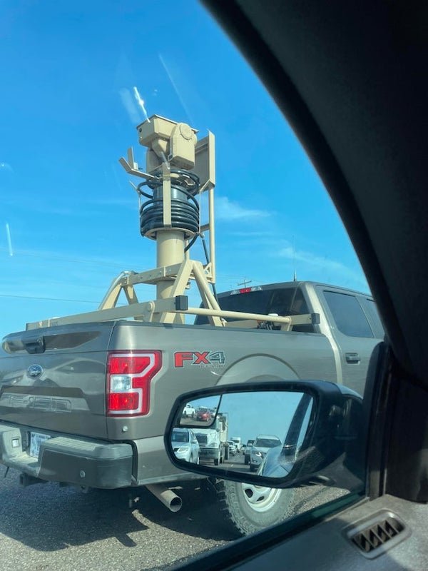 Heavy machinery being transported by government trucks

A: Video surveillance device, likely on its way to be installed on the border wall down south. Here’s a paper on it and it has some photos of the same device if you feel like scrolling down a bunch.