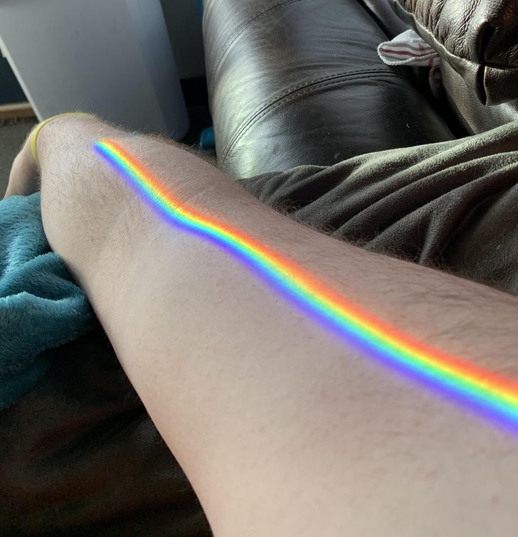 “A vibrant and clear spectrum of colors refracting through my apparently prismatic window onto my arm”
