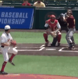 Pitcher throws the ball right into the umpire’s pocket.