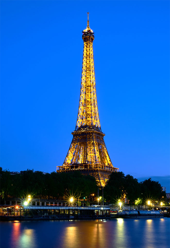 Profiting from the photographs of Eiffel Tower taken at night.