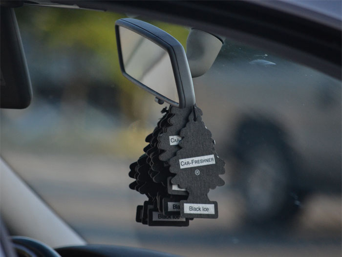 having stuff hanging from your rear view mirror.