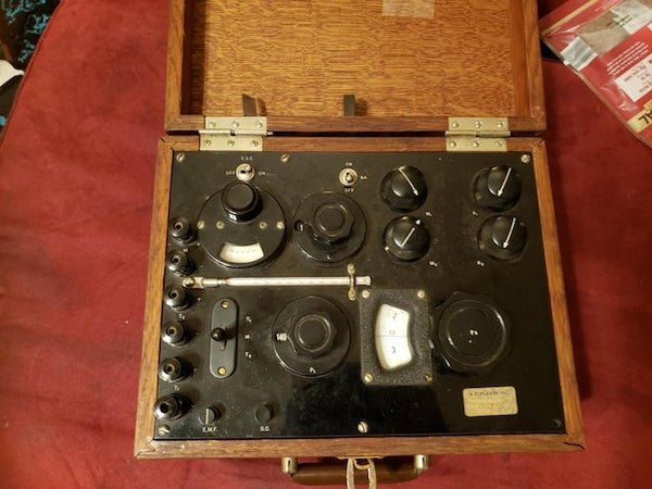 I found this thing at a garage sale. Its a wooden box. Lots of plastic dials and metal switches. Not sure what it is. Can anyone help?

A: The Bristol Company:

By 1915, the company was manufacturing the largest and most complete line of industrial instruments in the world, including instruments to measure and record temperature, electricity, pressure, motion, time, flow, and humidity. These instruments were the first to provide an uninterrupted history of manufacturing plant operations; increasing efficiency, improving quality, and allowing higher rates of productivity.

From that info, it might be part of a ‘chart recorder’ for high temps.