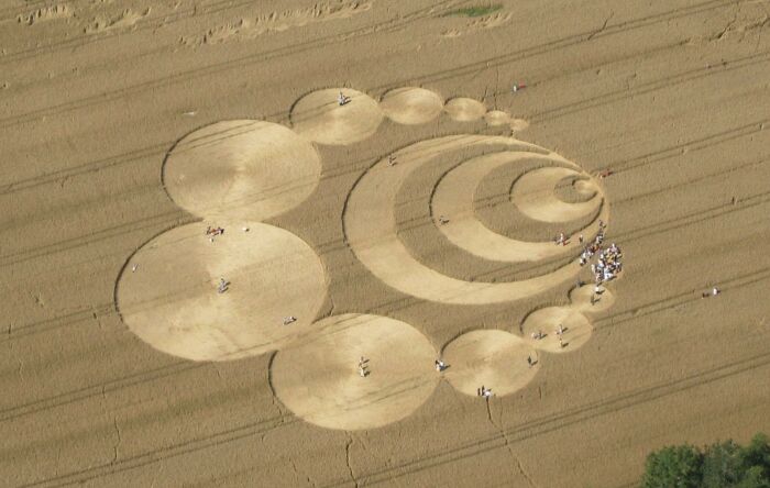 Crop circles were one of the more baffling phenomena of modern times. They usually appeared suddenly overnight. They looked like an unknown force had flattened the crops in a field into precise geometric patterns, all without damaging them. Reports of crop circles actually appear as early as the 16th century. But they became an object of public fascination in 1978, when one appeared in a field near Warminster, in Wiltshire, England. Afterward, hundreds of crop circles appeared throughout southern England and across the world. Without a scientific explanation, people came up with all sorts of theories to explain them, among meteorological forces and, of course, the usual suspect, aliens. It was believed that crop circles were actually "flying saucer nests," or sites of UFO landings. To some, they're the most concrete proof yet of extraterrestrial life.

Are crop circles just another misunderstood natural phenomenon, like most of the other mysteries on this list? Nope. This time, it was all a hoax. In 1991, friends Doug Bower and Dave Chorley came forward and admitted they had created the original Wiltshire crop circle. They admitted they'd been inspired by a letter published in a 1963 issue of New Scientist about "flying saucer nests," and decided to have some fun and see if they could make one themselves. They even showed the BBC exactly how they made it: They used a contraption called a "stalk stomper," or a simple board with ropes tied on each end. One of them stood holding one end of the rope, while the other stretched the opposite end of the rope as far as it would go and walked in a circle, allowing the board to gently push over the plant stalks. Bower and Chorley admitted to making hundreds of crop circles across England, always working under the cover of darkness.