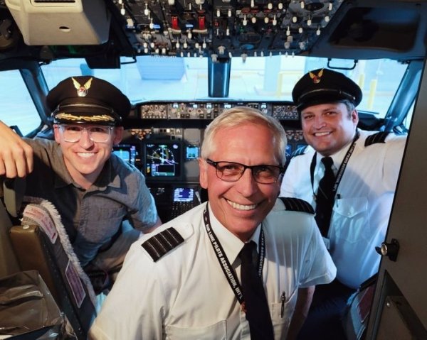How to convince an airline captain to let you wear his hat and allow you to sit in his seat: 1) Be his son. 2) Surprise him by flying across the country to board the last flight of his career. (It’s also helpful if you have a brother to be the copilot and co-conspirator in planning the surprise.)