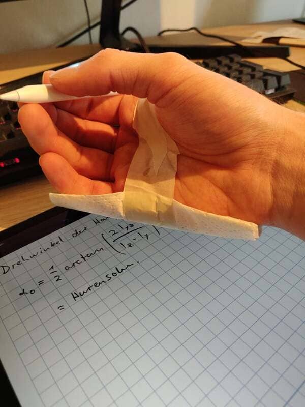 Taped a napkin to my hand to avoid having to drag sweaty palms across my screen.