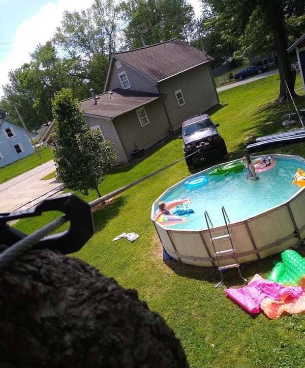 Jeep + winch + tree + pool = sweet summer zipline.