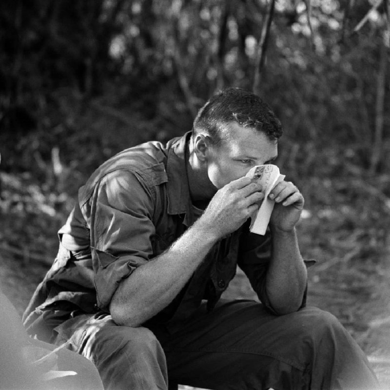 PFC Richie smells the perfume of his girlfriend back home in Jay, Oklahoma, as he opens her letter in Vietnam, 1966.