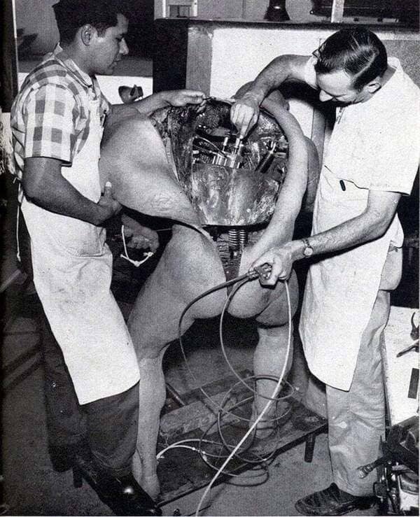 disney technicians repairing animatronic
