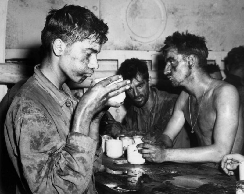 US Marines taking a coffee break after a brutal WWII battle (1940s)