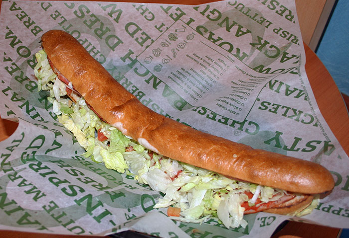 I worked at a gas station. Once, a guy came in, grabbed a foot-long sub from the sandwich case, opened it up, pulled a hair out of his own head, and stuffed it in the sandwich. He came up to the register and demanded a refund.