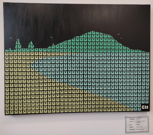 Landscape mural made with plastic bread tags.