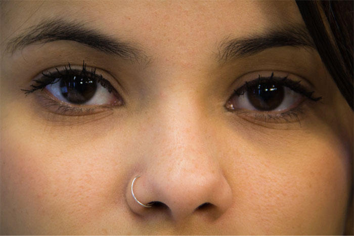 The space between your eyebrows is called glabella.