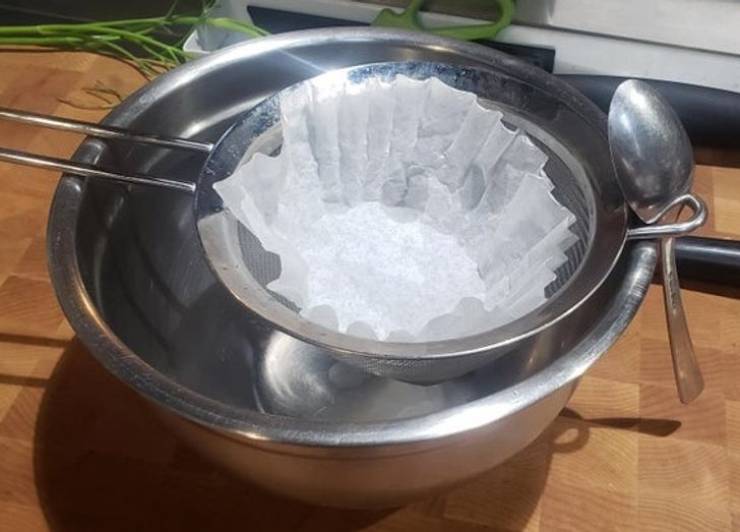 "Use a spoon to anchor your strainer."