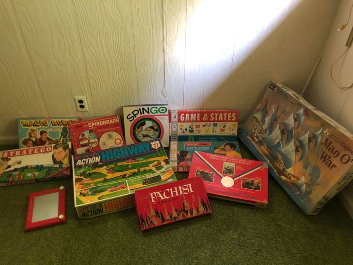 “Vintage board games found in an attic of new house.”