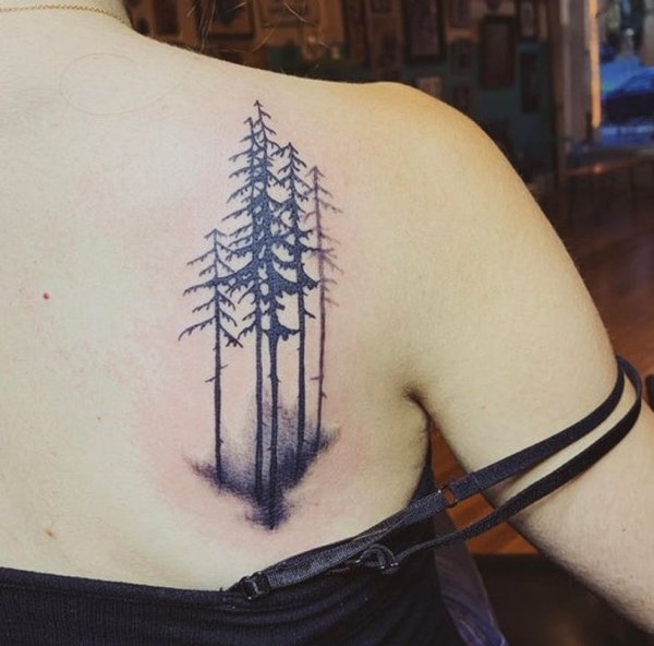 First tattoo. Each tree symbolizes a loved one in my life + a faded one for my mom who passed. Love the simplicity.