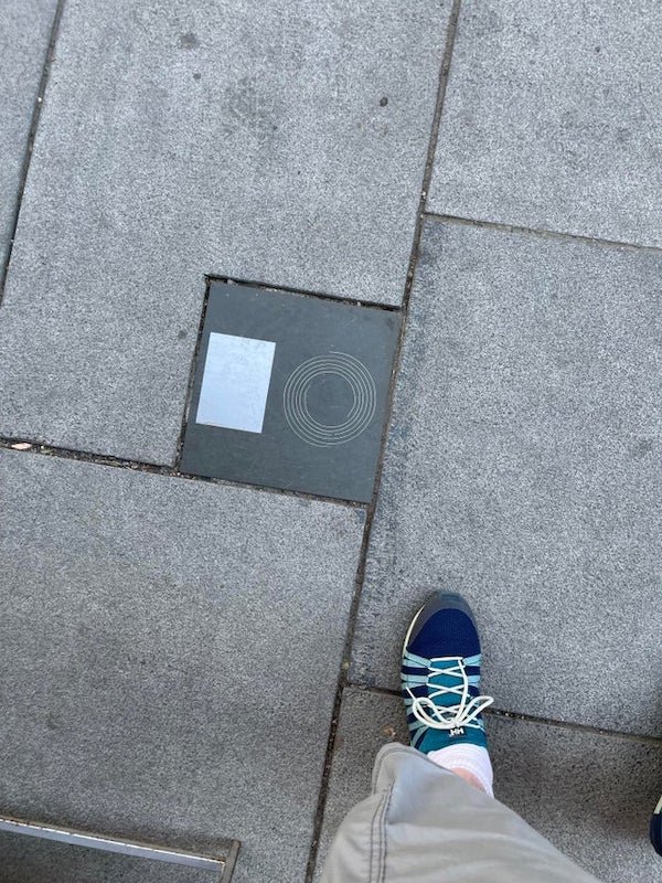 Saw these in sidewalks in two cities in Norway. About 12”x12

A: They are snow/ice sensors