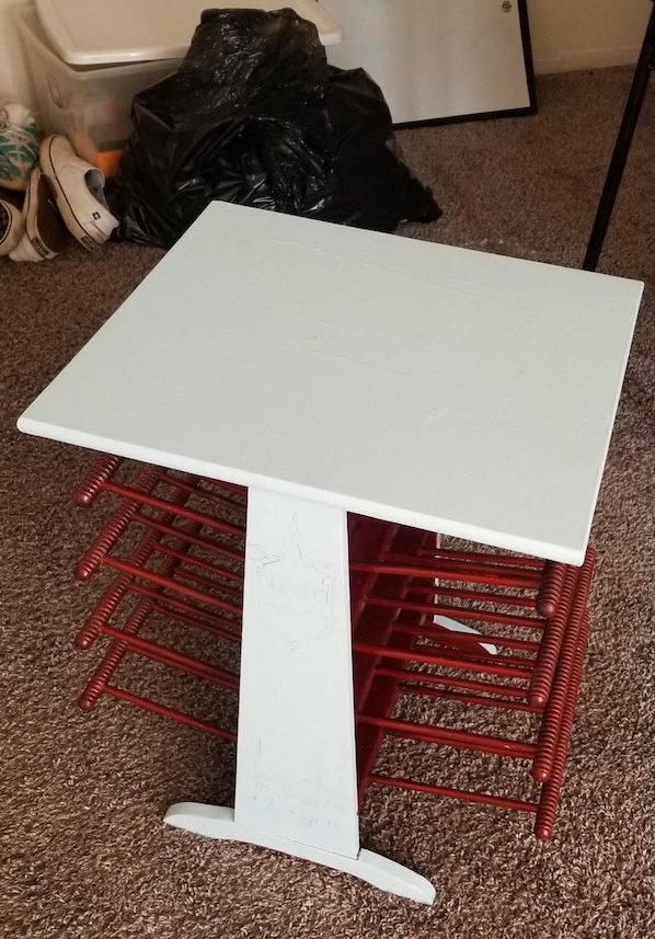 My friend found this on the side of the road and is just going to use it as an end table so they painted it but I’m so curious as to what this is actually for.

A: It’s a drying rack for artwork