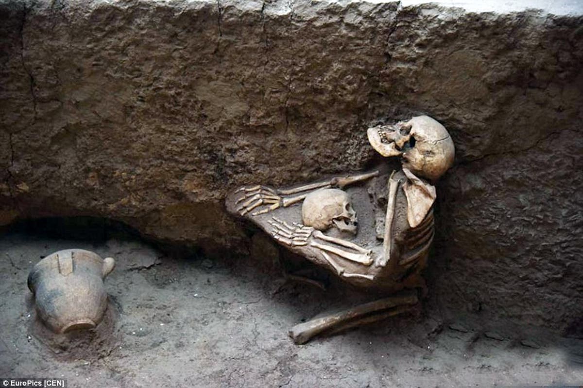 4000 yr-old remains of a woman trying to protect a child from a massive earthquake and floods that devastated China in 2000 BC, sometimes known as ‘China’s Pompeii’