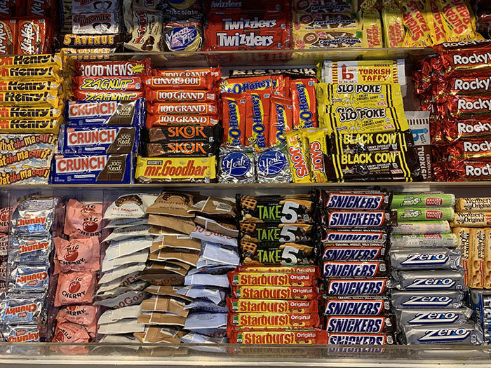 Whenever I see s cashier having a tough day, I always look at the candy selection, if there is one, and look stumped as to what to get. I ask them "I can't decide. What's your favorite?" I buy whatever they say, then hand it to them after the sale and tell them they're doing a great job and to have a great day. It perks them up every single time.

It's my little thing.