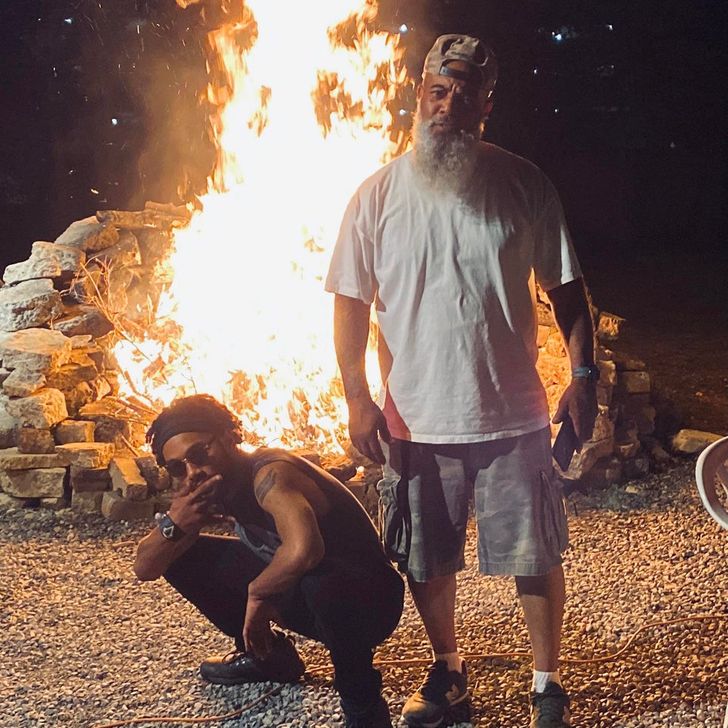 “My dad and I at the fire pit we just built”