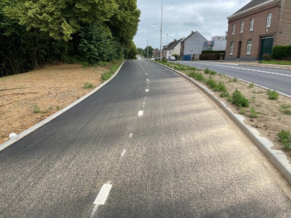 “The sand dispersed on this new bike lane make it look as though the sun is shining.”