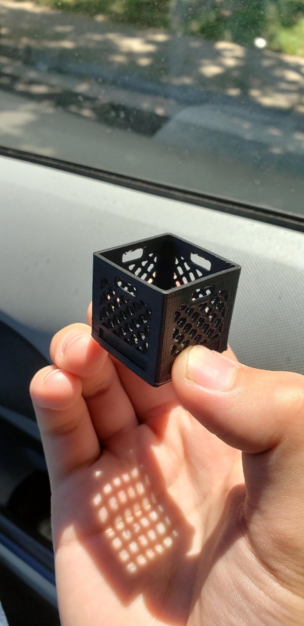 “A tiny milk carton holder my friend 3D printed for me.”