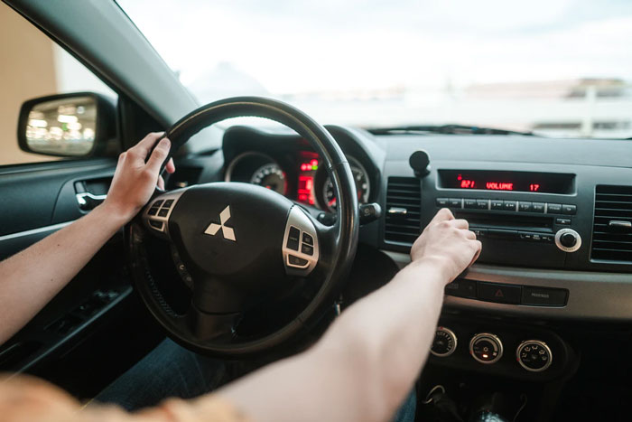 Your turn the volume off or lower it when you drive in unfamiliar places. In moments when you are focusing your attention on listening you are less aware of the visual information that your brain is getting.