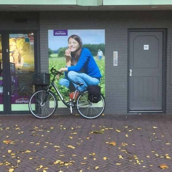 Big woman on a bike.