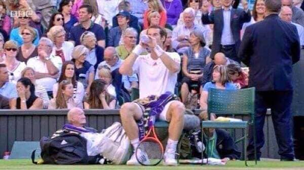 Old man hiding in Andy Murray’s kitbag.