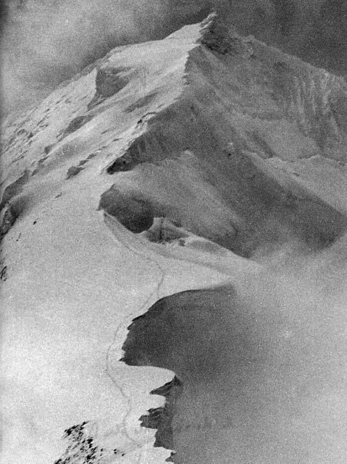 This is the photo Kurt Diemberger took after his companion, the illustrious alpinist Hermann Buhl, fell into the abyss on the Himalayan mountain Chogolisa. Buhl was walking behind Diemberger and momentarily left the trail after which he fell through an overhanging cornice. He remains in the ice.