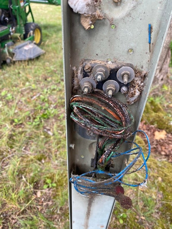 Found this near the front of my new property. There are no markings but there are wires inside. It’s not close to any electric sources I can see though.

A: It’s a phone wire junction pedestal.