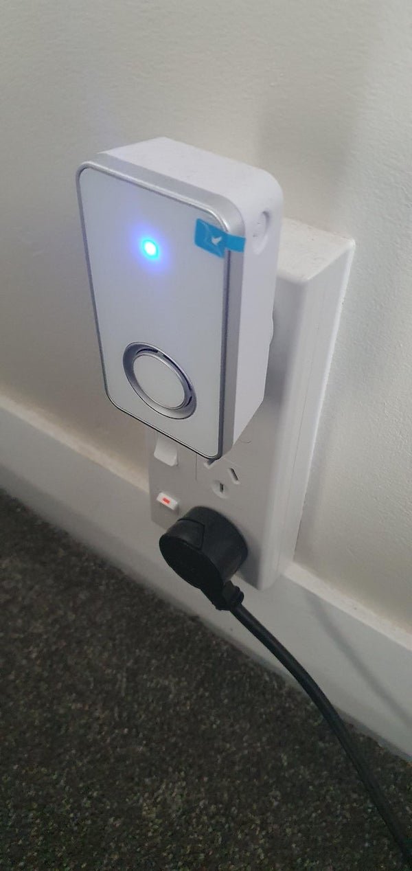 I found this in my Airbnb, I couldn’t see any visible brand on it, and it doesn’t appear to make any noise. I didn’t want to unplug it just in case I break something. – I think it’s around 11CM tall and 8CM wide then about 4CM deep.

A: Looks similar to some wireless door bell monitors. Try pressing the doorbell and see if this is it.