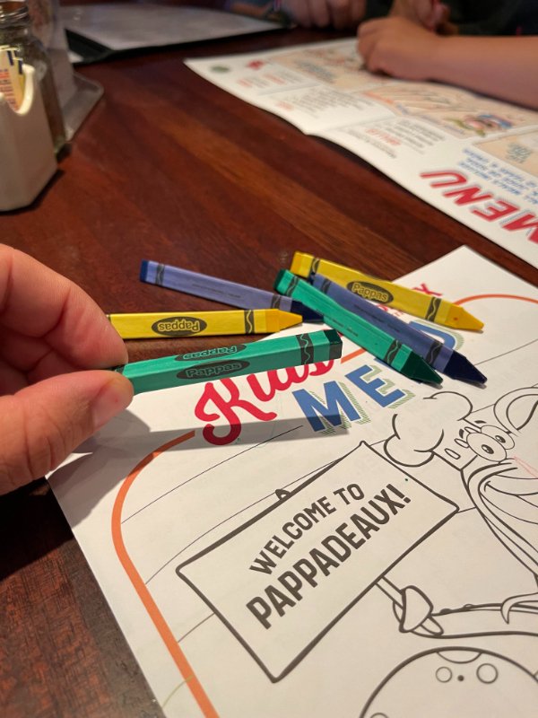 “These restaurant kids meal crayons with flat edges to prevent rolling off the table.”