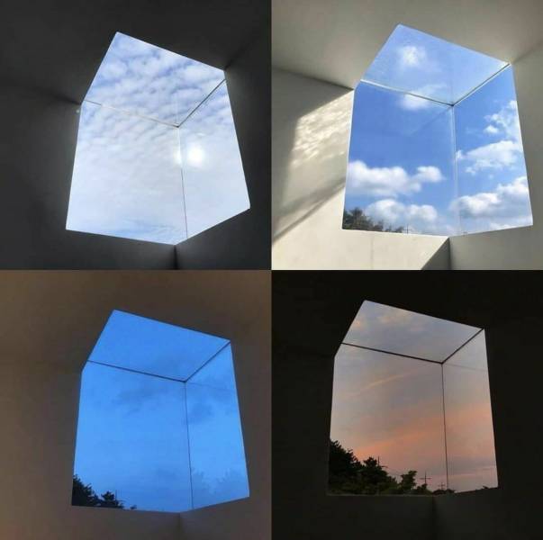 A non-standard architectural solution. A cubic window is like a passage to a parallel world