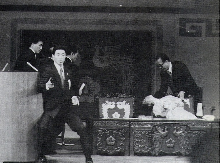 First Lady of South Korea Yuk Young-soo slumps down after being shot by a North Korean sympathiser, during an assasination attempt on her husband President of South Korea Park Chung-hee, on Korean Independence Day ceremony at the National Theater of Korea in Seoul – 1974