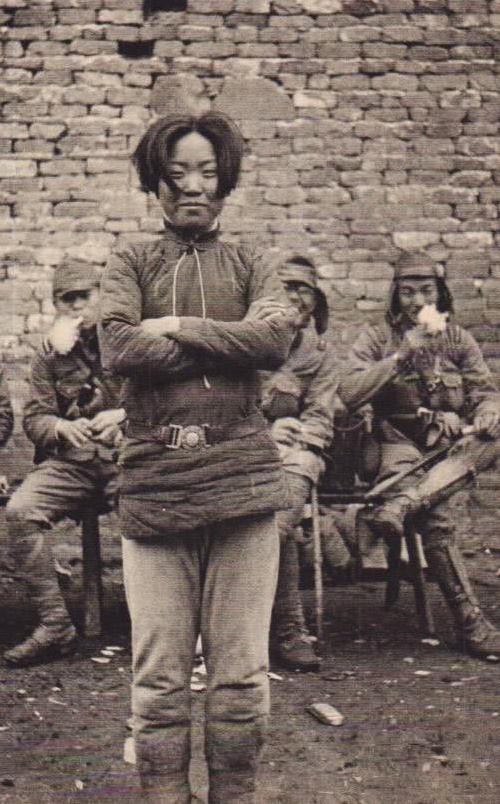 Chinese guerrilla fighter Cheng Benhua miling moment before execution by the Japanese, she was 24. (Late 1938)