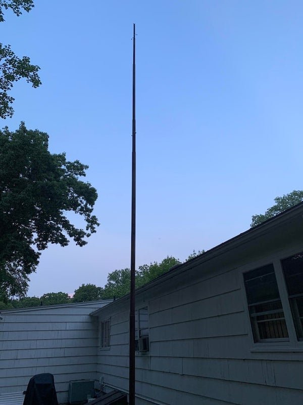 What is this large metal rod in back of house – Id like to know if it can be removed! Maybe it is a lightning rod? We live at a slightly higher elevation in the city.

A: Antenna pole from TV antenna