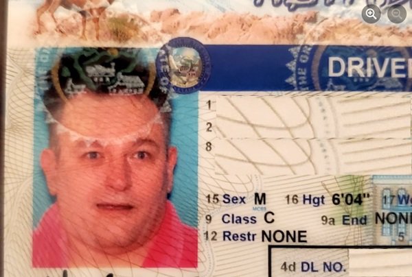 I have a long-standing battle with my buddy for the most ridiculous photo ID. My wife suggested I wear my mother’s hot pink bathrobe and “Gary Busey” my hair for my new DRIVER’S LICENSE photo, so I did.
