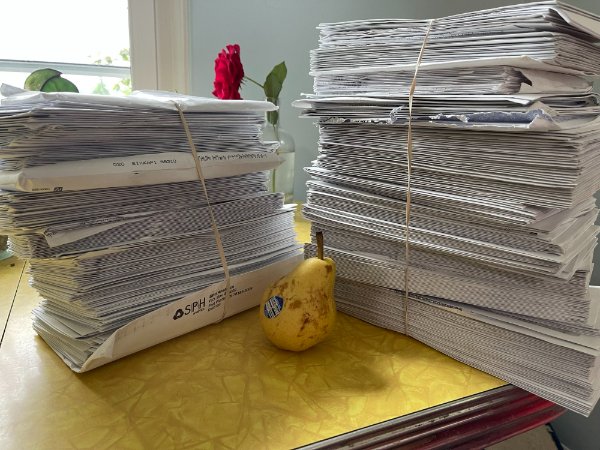 “I’m being over charged by insurance after my daughter was born. This is the pile of mail I have to go through to prove they’re ripping me off. Pear for scale.”