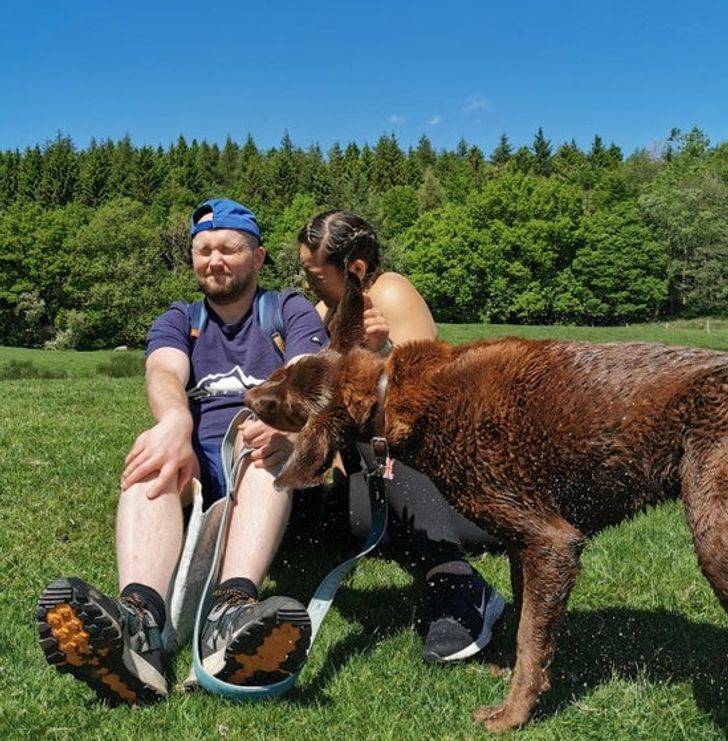 “We were trying to take a nice photo with the dog. Wet boy had other plans.”