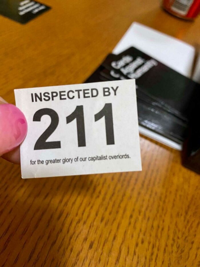 label - Inspected By 211 for the greater glory of our capitalist overiords.
