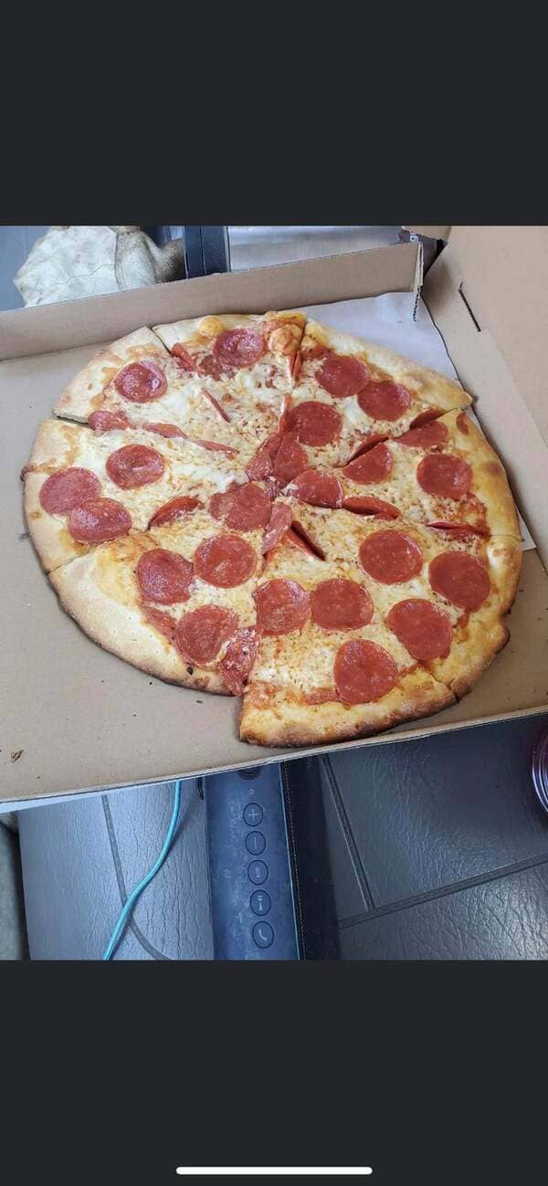 My friend ordered a pizza and got two different ones….
