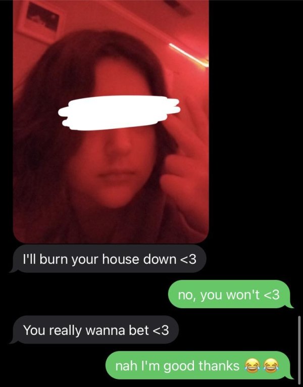 photo caption - I'll burn your house down